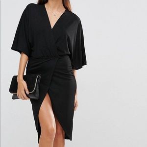 Never worn! ASOS Club L Wrap Dress in black.